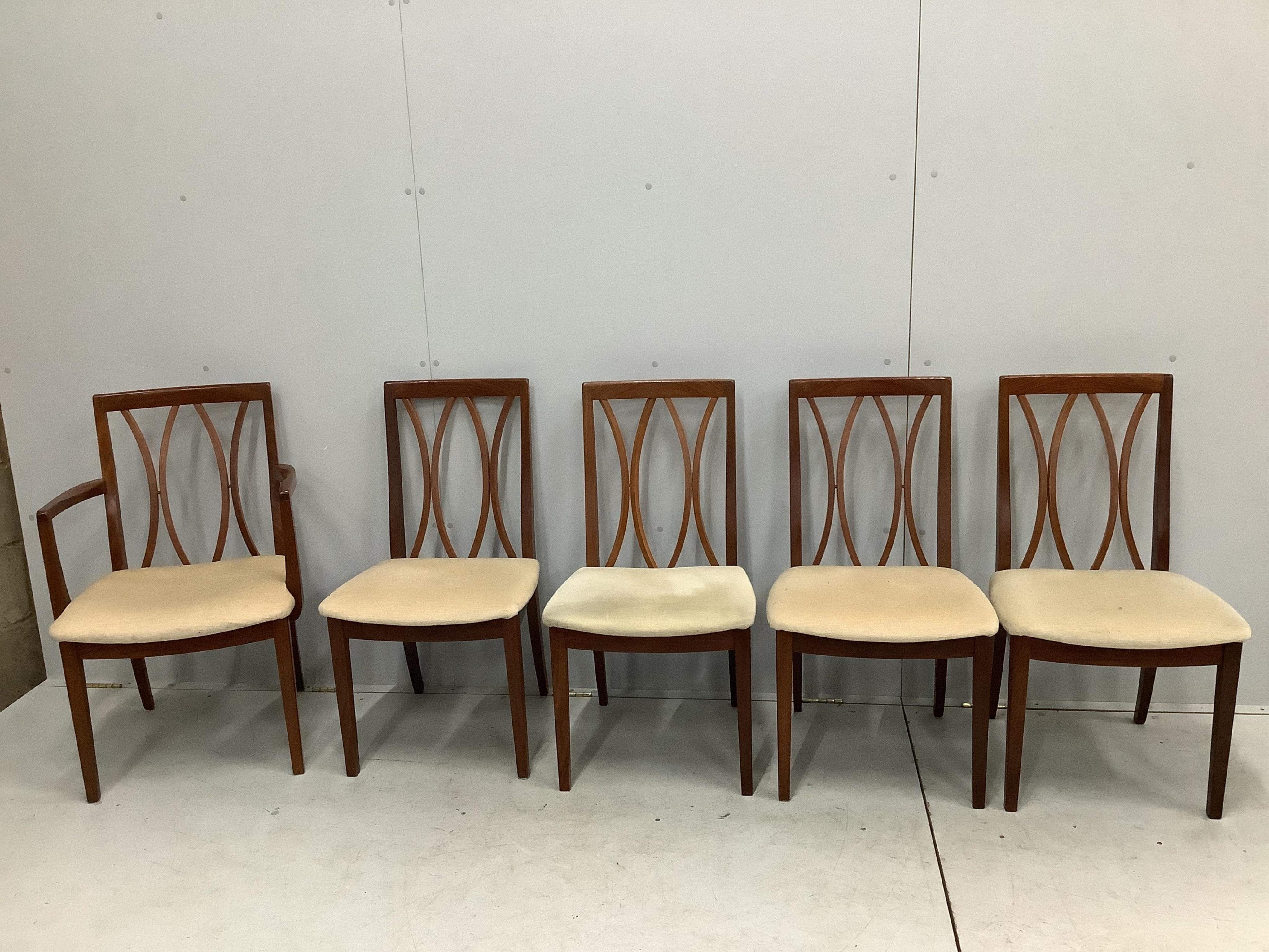 A G Plan Fresco teak dining table and five chairs, one with arms. Table 170cm extended, depth 120cm, height 73cm. Condition good.